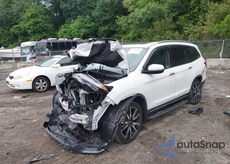 2020 Honda Pilot Awd Touring 8 Passenger z USA, uszkodzony, nr VIN 5FNYF6H91LB053626